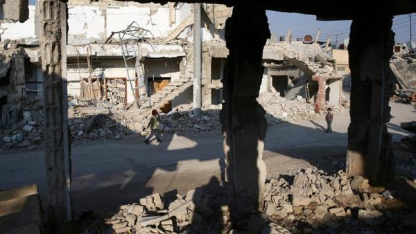Damaged buildings in the rebel-held besieged city of Douma on the outskirts of Damascus