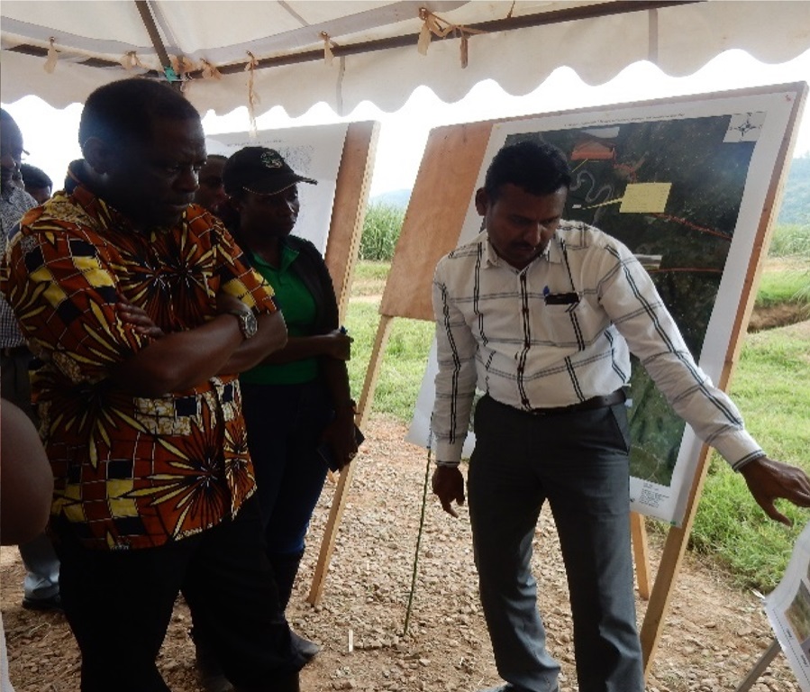 MINAGRI State Minister receiving explanations on his visit to compartment 6 in Mageragere Sector, Nyarugenge District