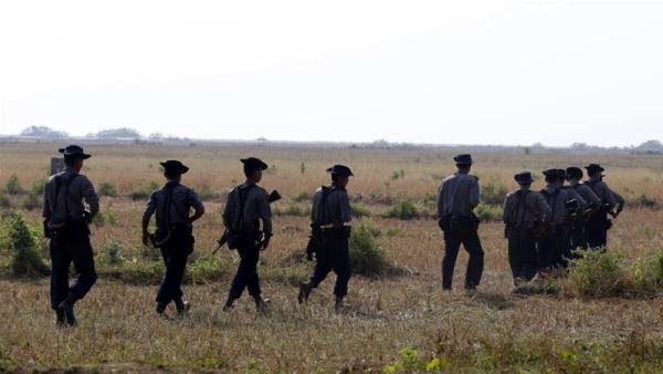 Myanmar police patrol near villages close to Rakhine state