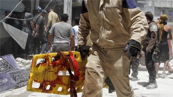 Air strikes hit a popular market in the rebel-controlled town of Ariha in Idlib Province 