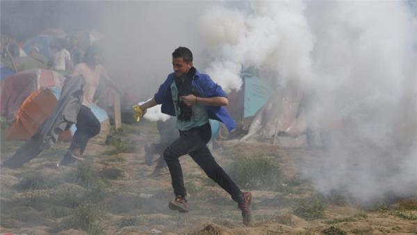 Macedonian police confirmed the incident but said the tear gas had not come from their side