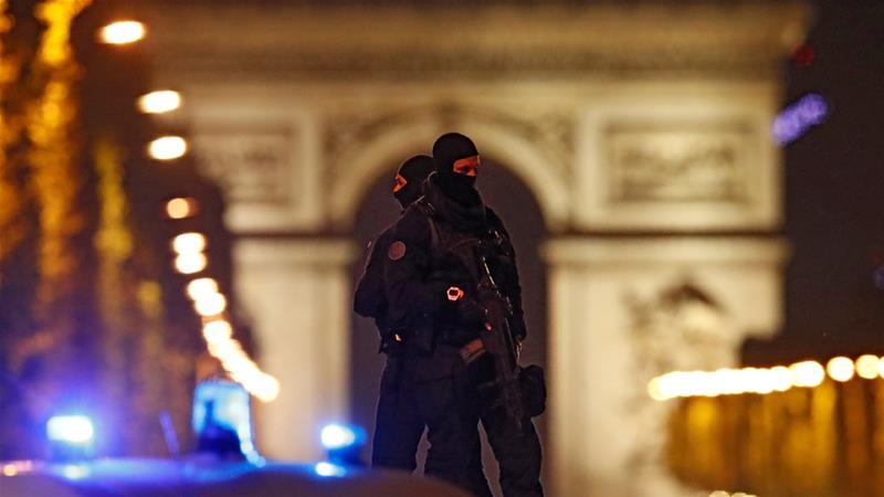 Police secure the Champs Elysees following the attack