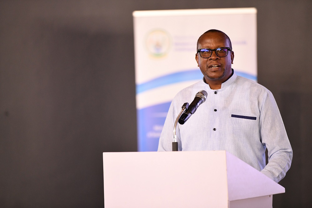 Dr. Jean Damascène Bizimana, the Minister of National Unity and Civic Engagement speaking to the youth during the 14th cohort of the Indangamirwa civic training program on August 9, 2024. 