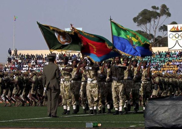 Eritrean soldiers parade during the young country's 16th Independence day celebrations in Asmara on May 24, 2007. Eritrea has also been accusing Ethiopia for hosting the Eritrean Democratic Alliance, which is a group of 13 political groups working to end Isayas’ regime.