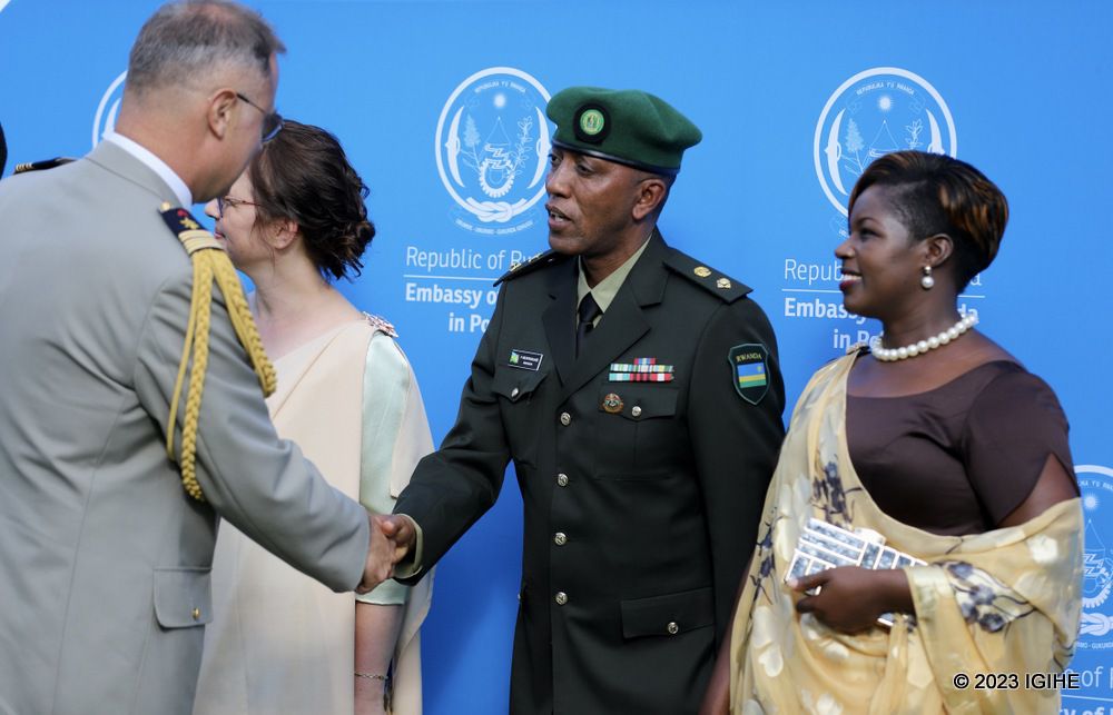 Defence Attaché  at Rwanda's Embassy in Poland,Lt Col Pascal Munyengabe greeting his counterpart from French Embassy in Varsovie.