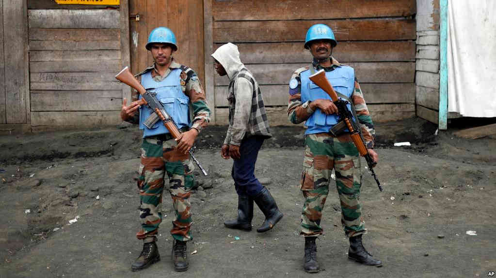 Two MONUSCO UN soldiers stand guard in Goma's port.