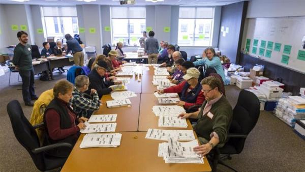 Wisconsin election officials have less than two weeks to complete the recount