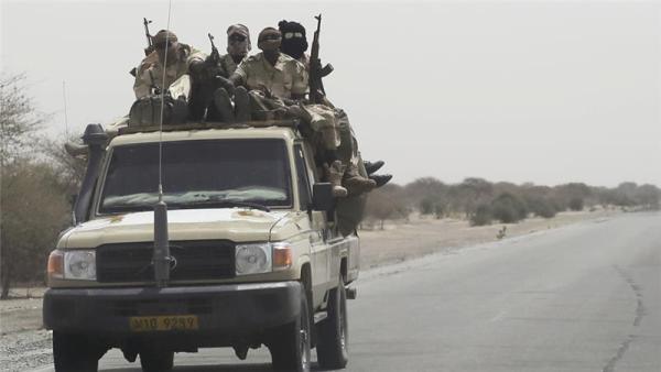 Chadian troops ride towards Lake Chad near Bashoum in March 2015