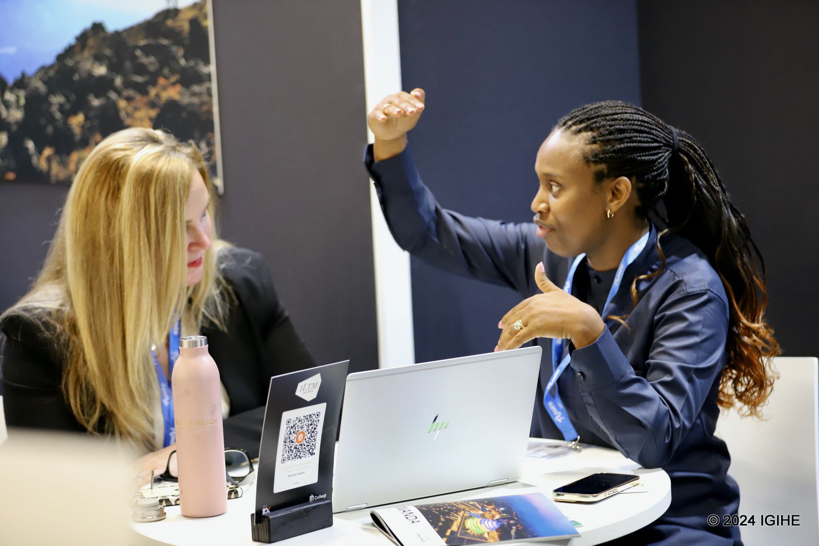 Betty Mutoni, Marketing Manager at Primate Safaris taking a visitor through offered services.