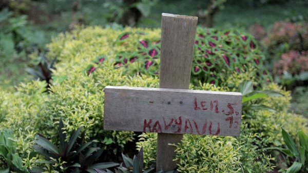 Wooden crosses mark the graves of those killed in the attack on the district of Kalongo, in Beni territory, North Kivu, in May 2015