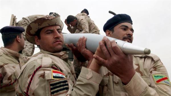 Backed by US-led coalition strikes, the troops are now less than 3km from the town centre