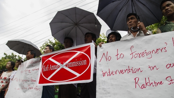 Many booed and shouted "No Kofi-led commission" as his convoy left Sittwe's airport 