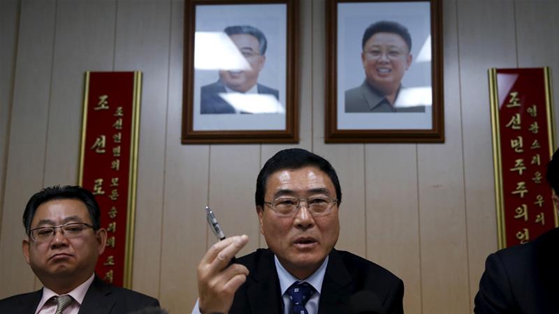 North Korean diplomat Choe Myong-nam, left, is seen at a press conference in this 2015 photo