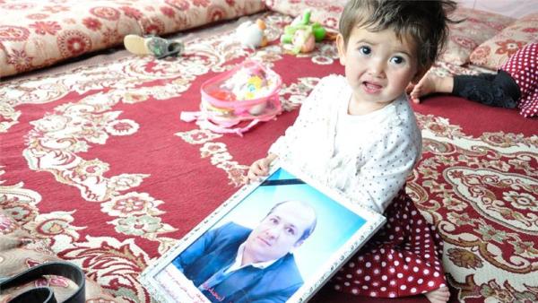 Ali Mohammadi's wife says her daughters always ask for their father
