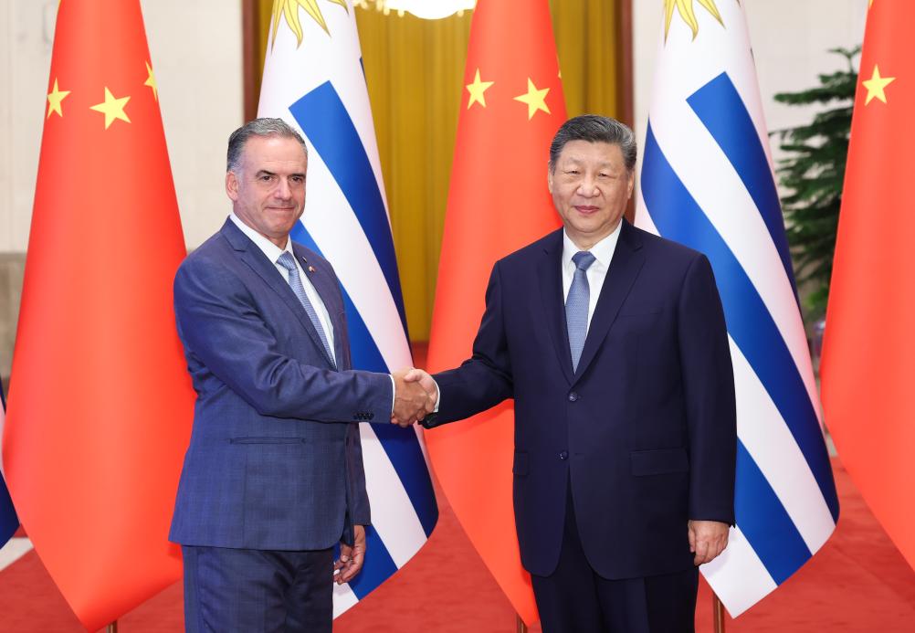 Chinese President Xi Jinping holds talks with President of the Oriental Republic of Uruguay Yamandu Orsi, who is on a state visit to China, at the Great Hall of the People in Beijing, capital of China, Feb. 3, 2026.