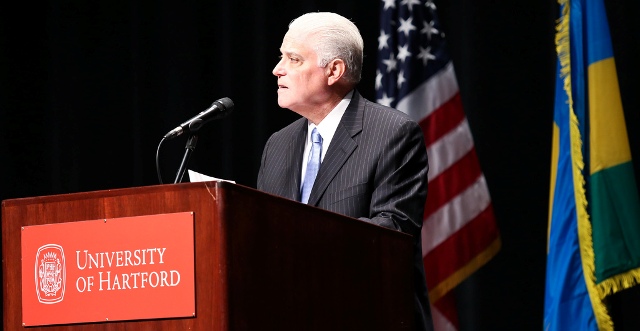 Walter Harrison, President of the University of Hartford welcomes Kagame to Hartford .