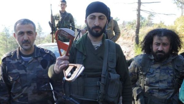Turkmen rebels showed off what appear to be part of the pilots' evacuation equipment near the northern Syrian village of Yamadi