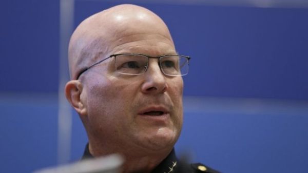 Mr Suhr - a veteran officer - was appointed city police chief in 2011