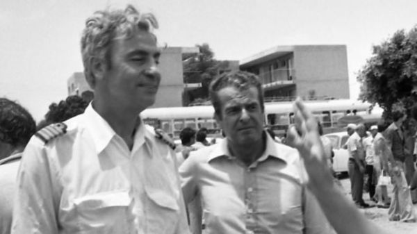 Capt Bacos (l) turned down the chance of freedom, refusing to abandon his passengers