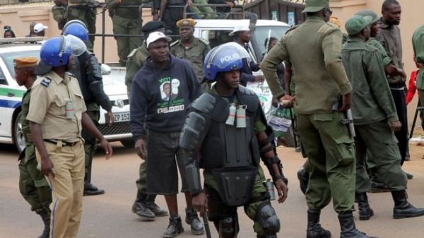 Zambian police broke up skirmishes between rival political supporters in Lusaka just hours before polls opened