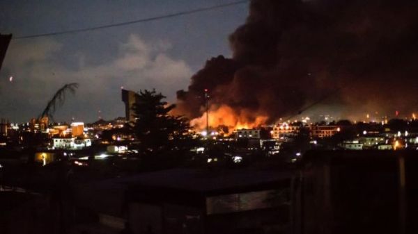 Smoke and flames poured from the national assembly building in Libreville