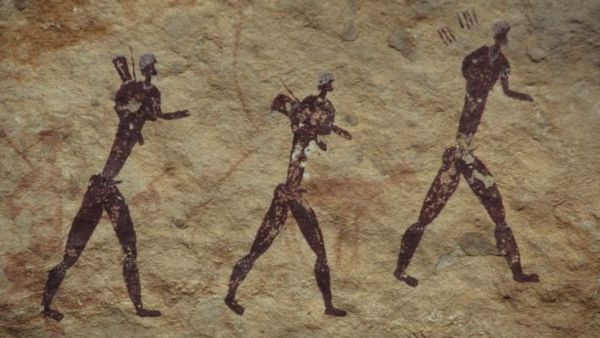 The early migrants were hunter-gatherers, like the people depicted in this much more recent rock art from South Africa