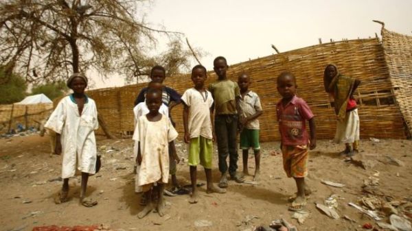 Survivors of alleged chemical attacks have reported their eyes and skin changing colour. Pictured: Children in North Darfur in April