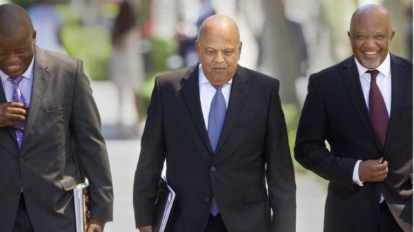 The efforts of Pravin Gordhan (C) to rein in government spending have won him respect