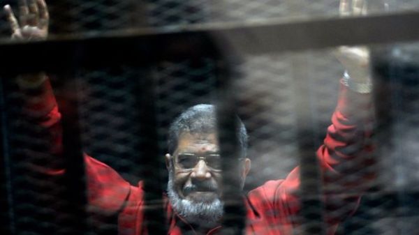 Mohammed Morsi's supporters say the trials are attempts to give legal cover to a coup