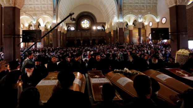 Many mourners express outrage at the state's failure to protect the Coptic Christian minority