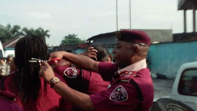An aide to President Buhari said the haircuts were "a humiliation of women"