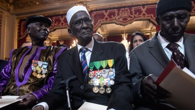 Many of the veterans wore medals pinned to their suits