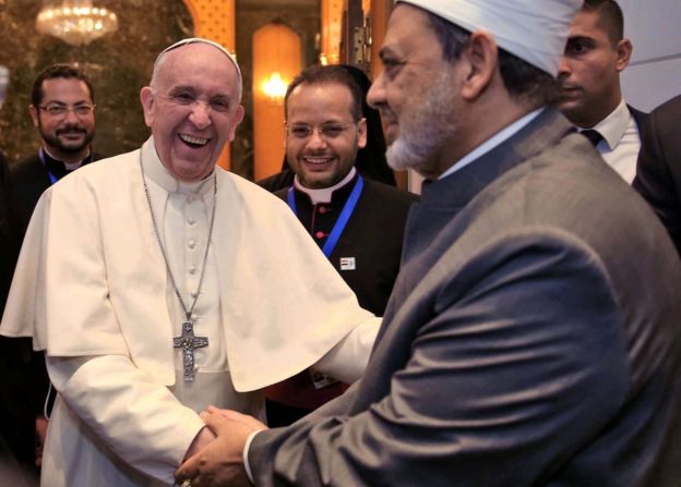 Pope Francis was invited to Egypt by Sheikh Ahmed al-Tayeb, the grand imam of Al-Azhar (right)