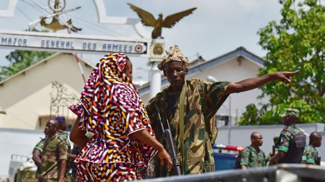 Rebellious soldiers took up positions near the military's headquarters in Abidjan on Friday