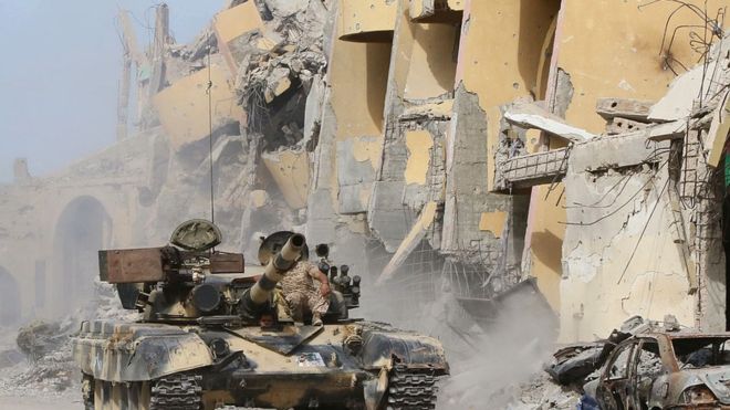 A spokesman for a government-linked faction says they liberated the airbase