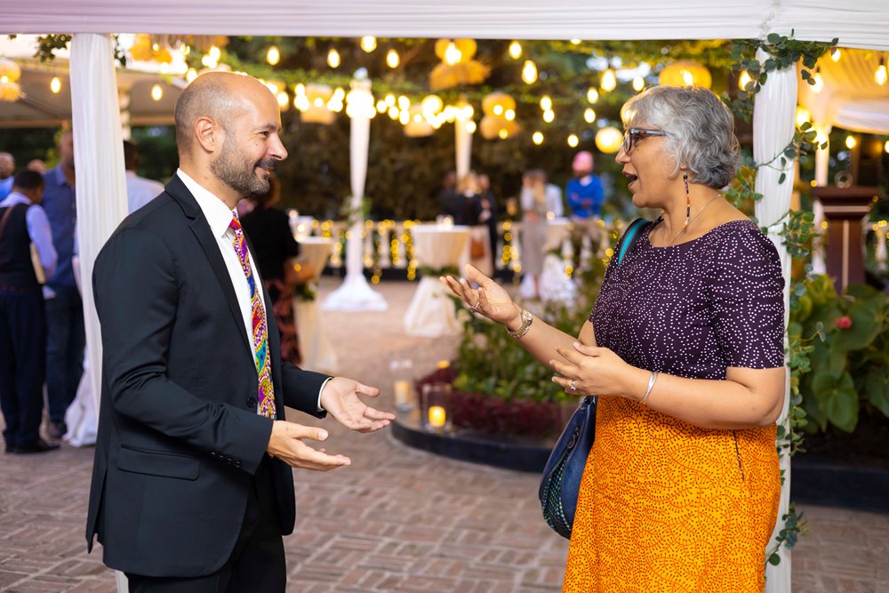 British High Commissioner to Rwanda. Omar Daair chatting with a participant of the event.   