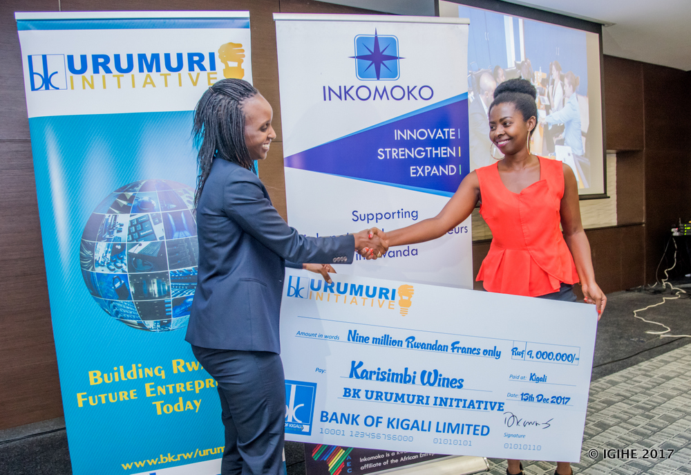 Assumpta Uwamariya, a 2017 Urumuri winner and CEO of Karisimbi Wines, receiving her prize