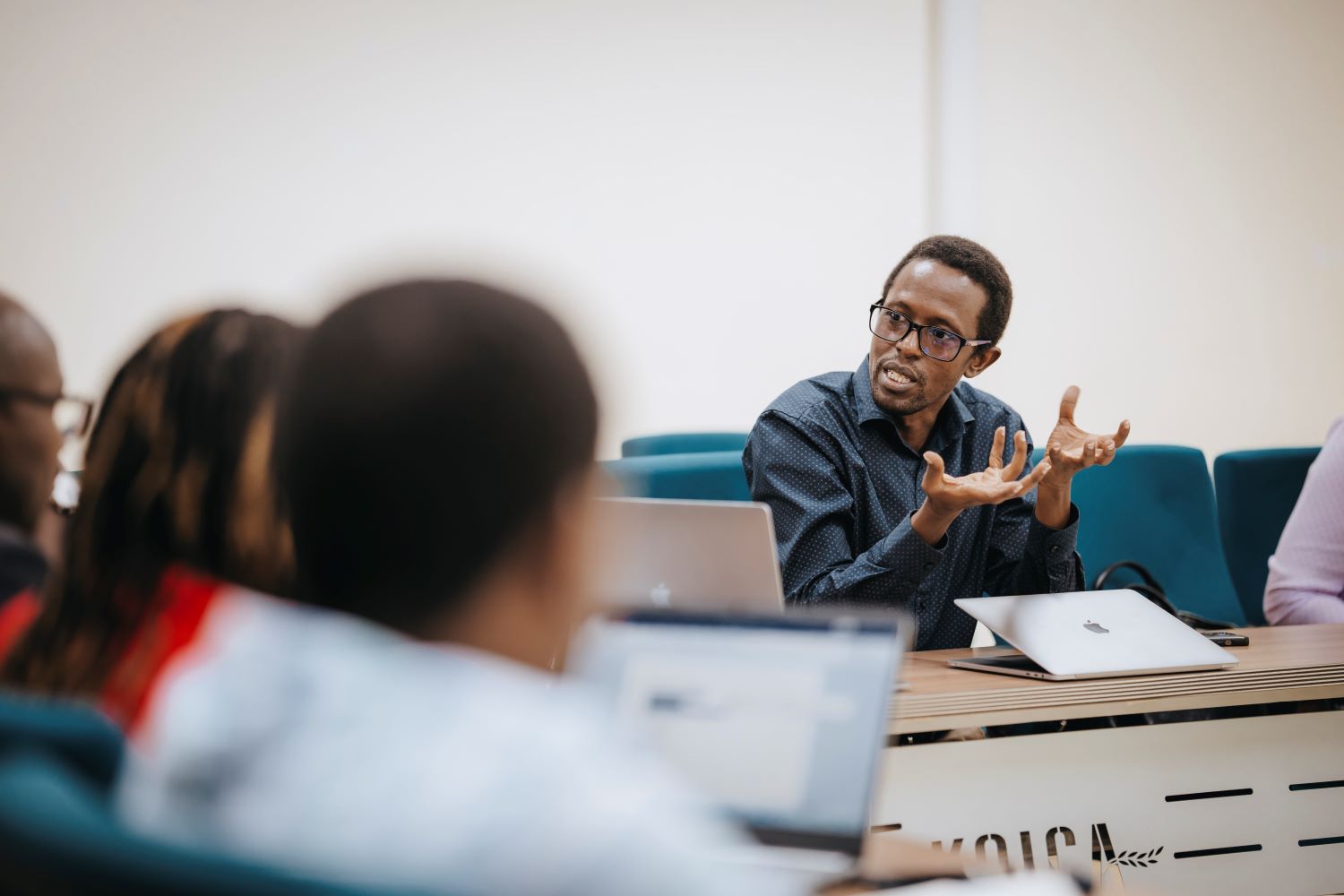 Dr. Said Ngoga, Technology Innovation Division Manager at RISA, makes a contribution point during the project presentation.