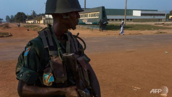 A Congolese soldier of the African-led International Support Mission to the Central African Republic stands guard after clashes in Bangui on Feb 19, 2014.