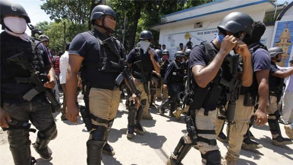 As the police tried to enter the house, the suspects opened fire from inside