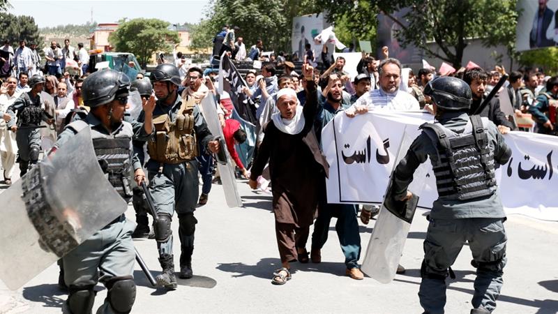 Protesters clashed with police near the site of Wednesday's blast