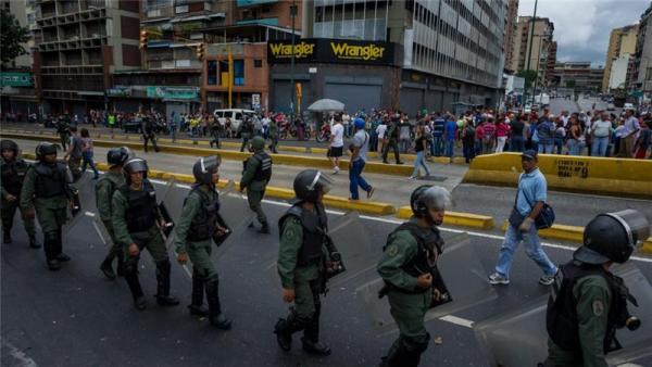 Maduro's opponents say Venezuela faces severe unrest in the referendum's absence