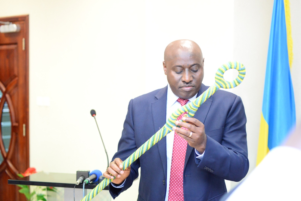 CG Gasana received a gift after being handed over the office