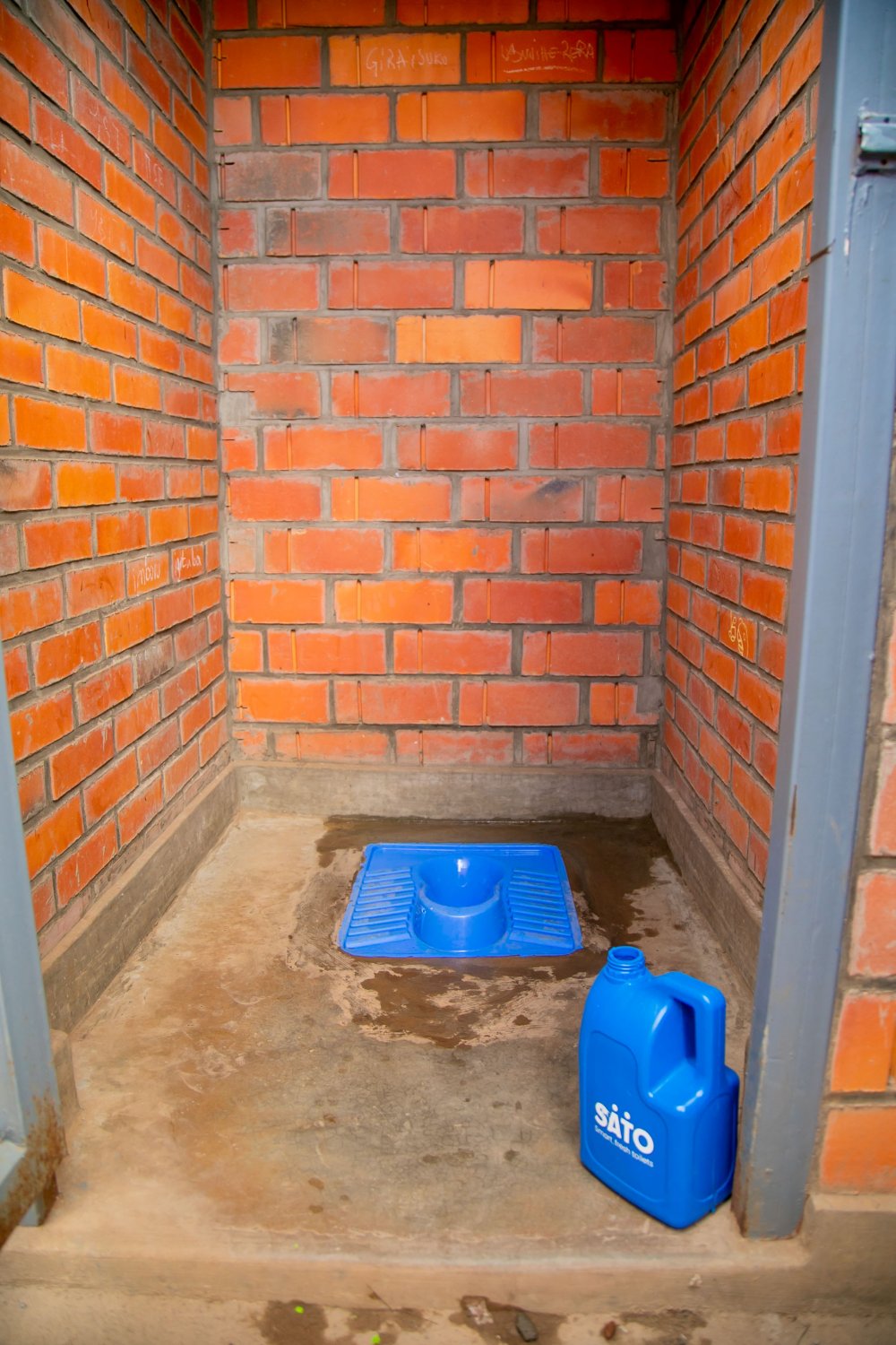 SATO’s toilet pans are made of plastics and placed directly over pits.