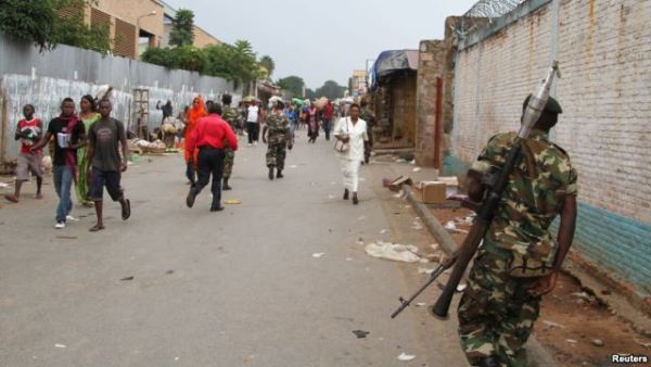 A soldier patrols the streets after a grenade attack of Burundi's capital Bujumbura, Feb. 3, 2016. The East African Community (EAC), meeting in Arusha, Tanzania Wednesday named the 77-year old Mkapa to hopefully breed new life into talks.