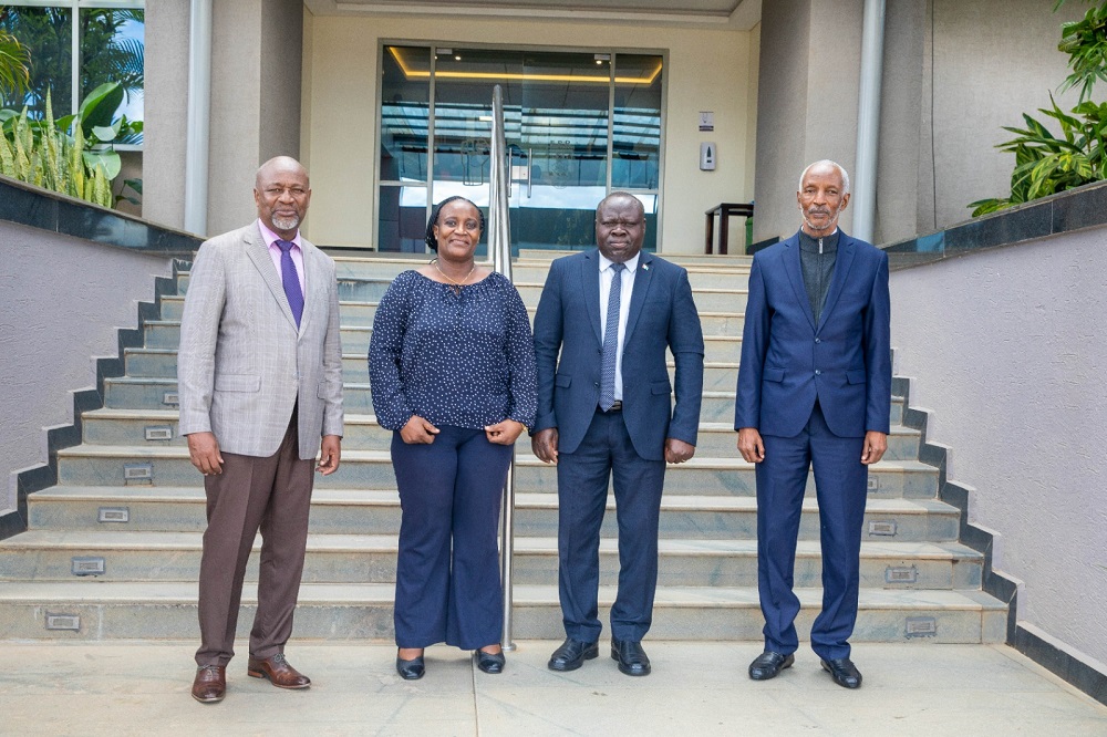 Gasamagera and Uwimana in a group photo with their predecessors Bazivamo and Ngarambe.  
