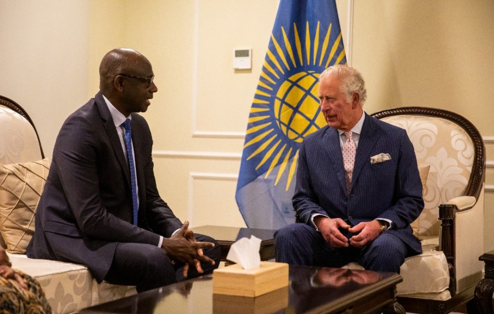 Prince Charles with Rwanda's High Commissioner to the United Kingdom, Johnston Busingye after arriving in Rwanda. 