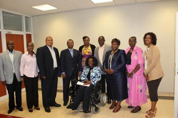 A delegation of parliamentarians from Kenya and CEO of RGB Prof.Shyaka Anastase pose for a photo