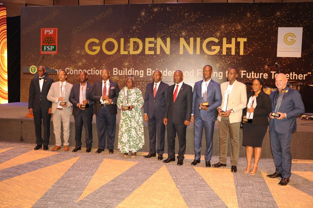 The awardees taking a group Photo with the Prime Minister, Edouard Ngirente
