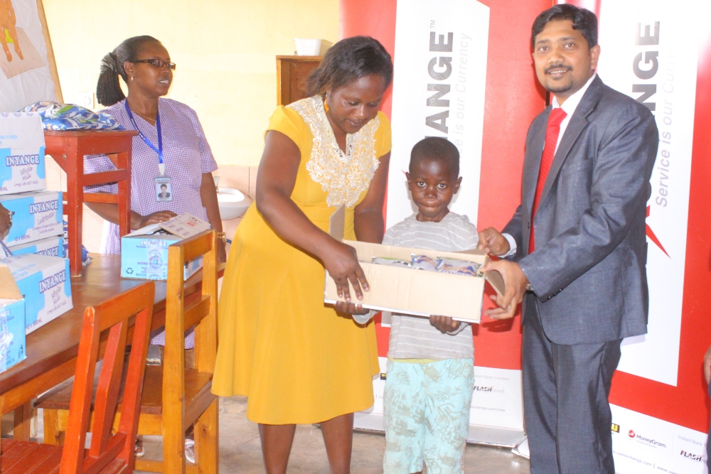 One of the children receiving milk packages 